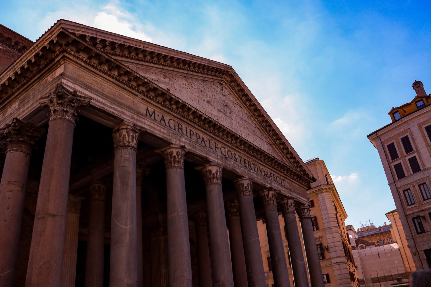 A great marble temple beneath a clear blue sky